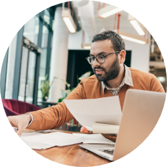 Accountant working from desk.